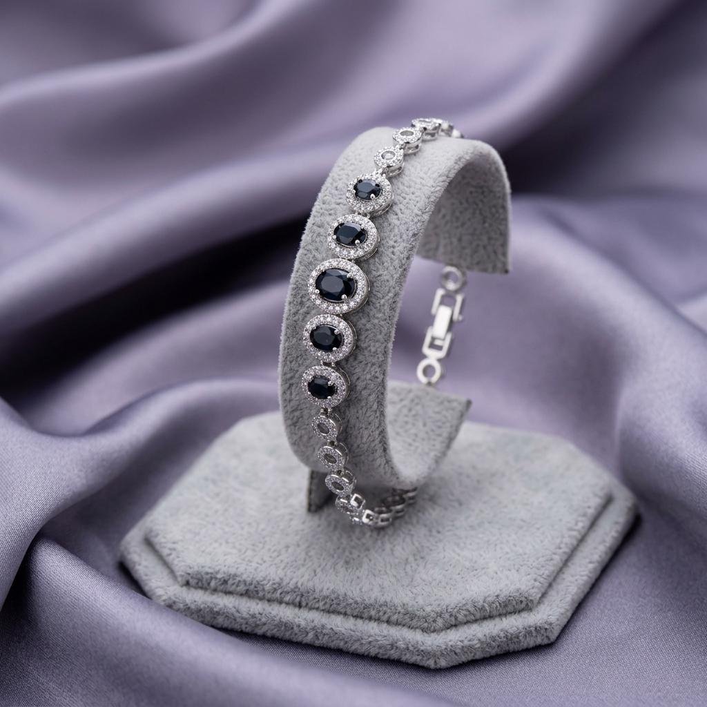 Elegant Silver Bracelet with Black Oval Stone Details for Women