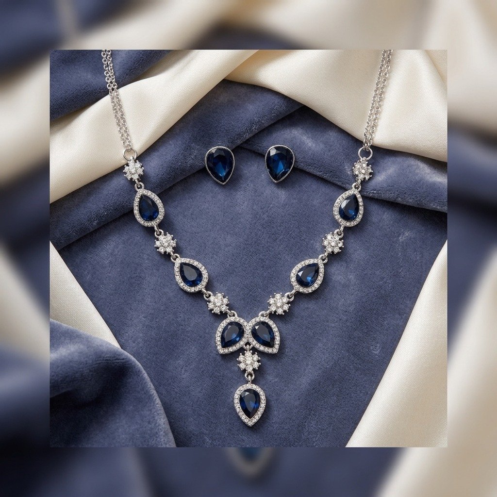 Sapphire Blue Teardrop Halo Jewellery Set